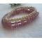 This 3 stack bracelet is pink and cream.  It is stretchy and very pretty.